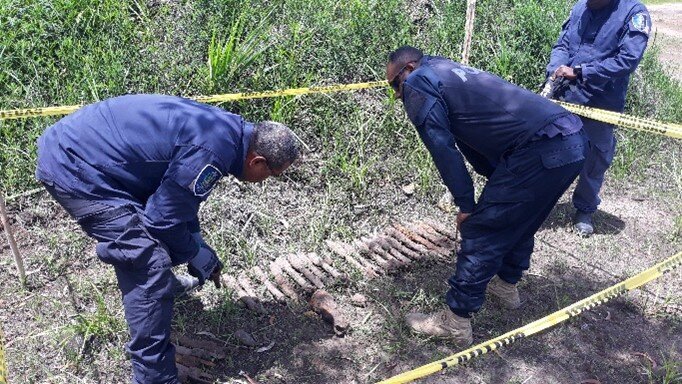 SIEOTEC officers recovering WWII ordnance, Solomon Islands