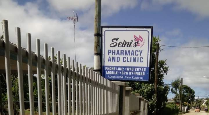 Seini's Pharmacy and Clinic street sign