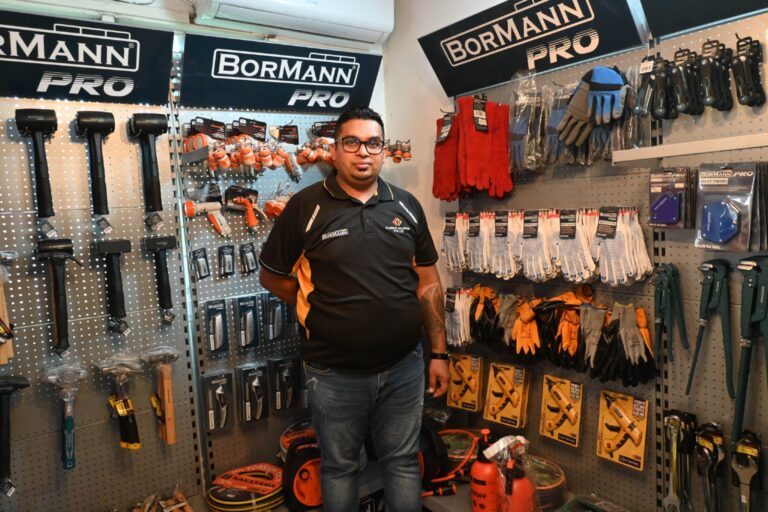 Fiji Genuine Suppliers – Retail Store Owner With Tools Display