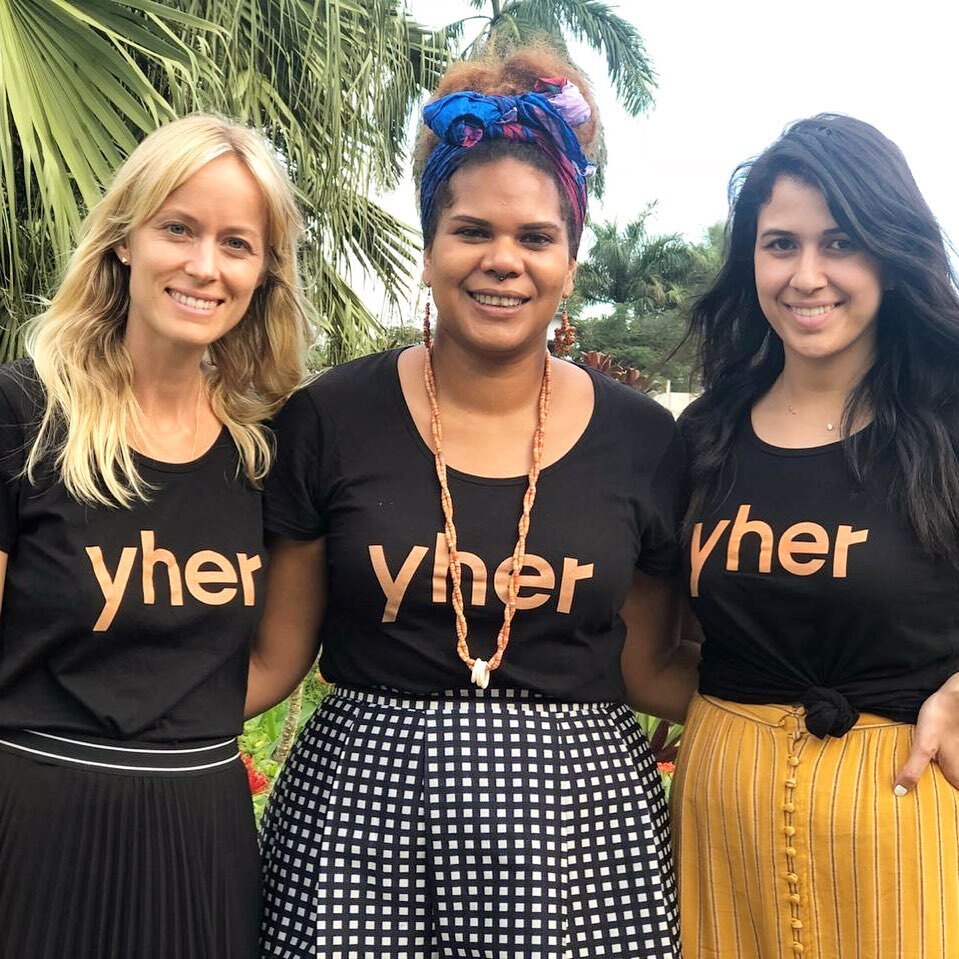 Three happy women from the same community at the garden