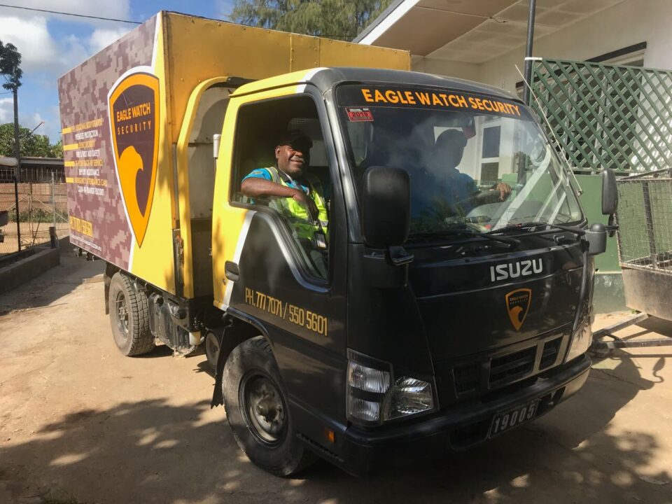 Eagle Watch Security truck is parking at the street