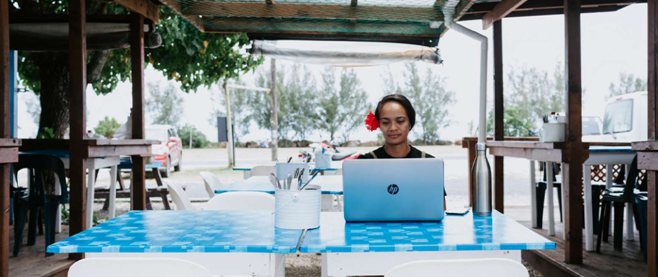 Woman Working Remotely on Laptop