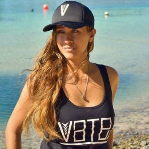 Woman wearing Fave Designs VBTB cap and top, Cook Islands