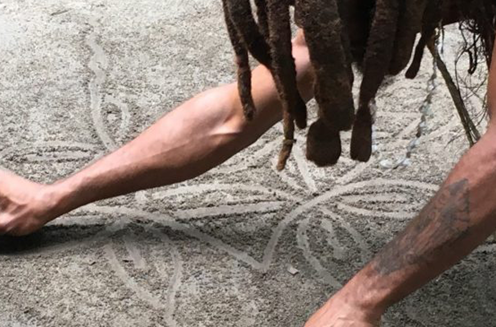 A man installing floors and carpets