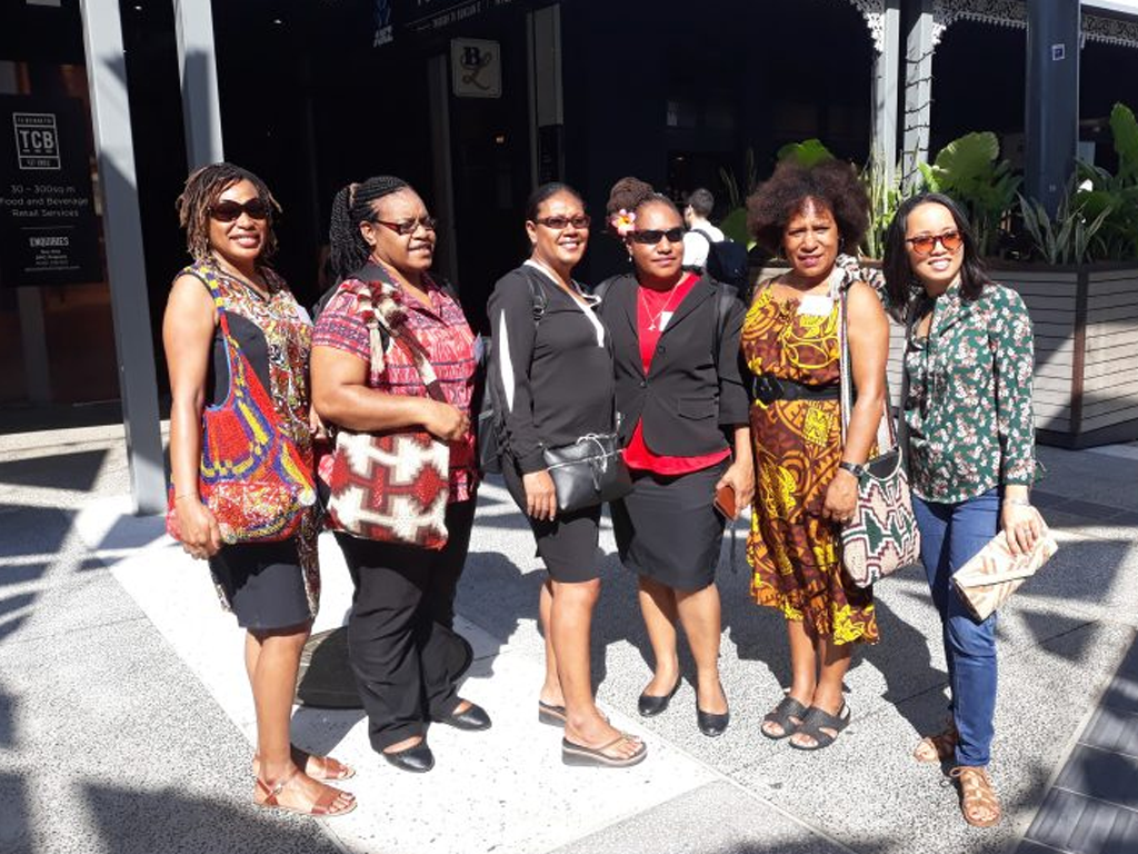 Women at the entrance of the shop