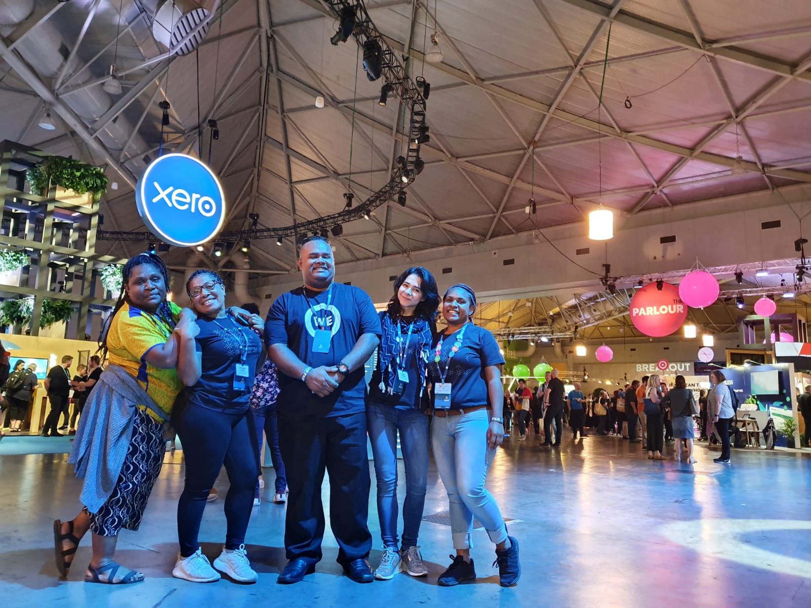 Group of people sharing at the event stand