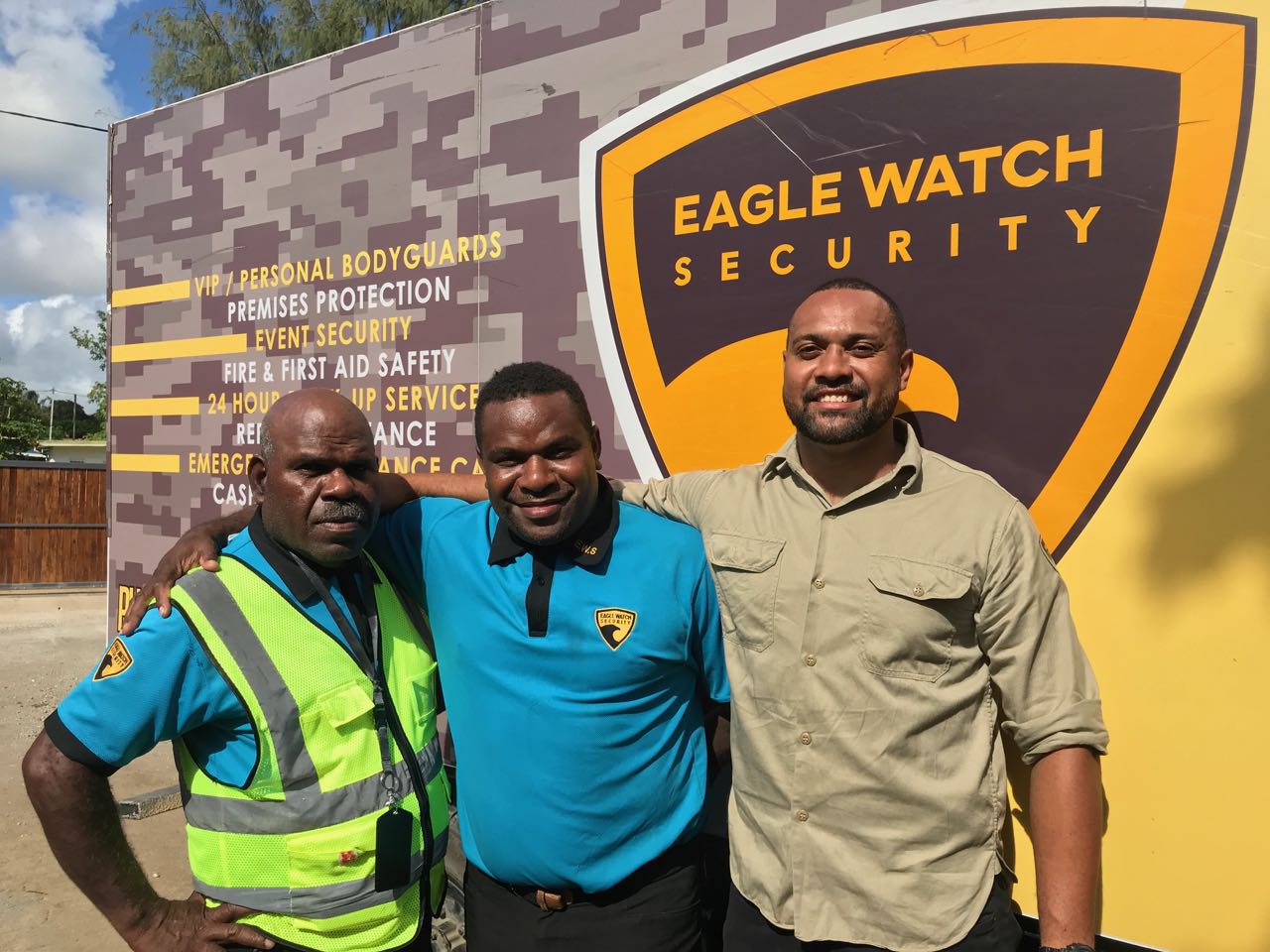 Eagle Watch security team in front of the company