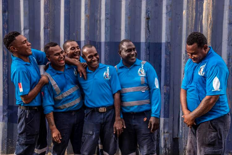 Team photo at Pure Water Factory in PNG