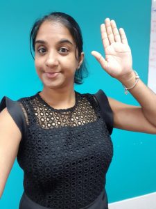 Jessica Gounder raising her hand against inequality