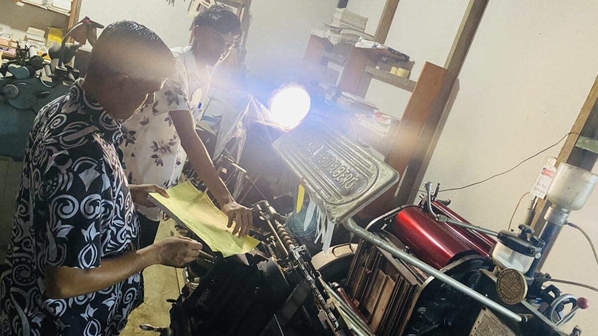 Traditional printing press operation Pillays Printer