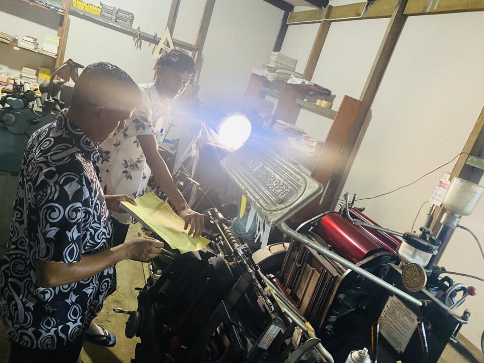 Traditional printing press operation Pillays Printer