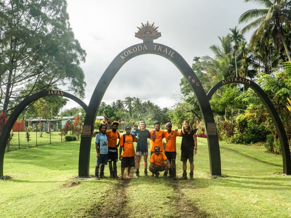 Visitors at the Kokoda Trail landmark in Papua New Guinea