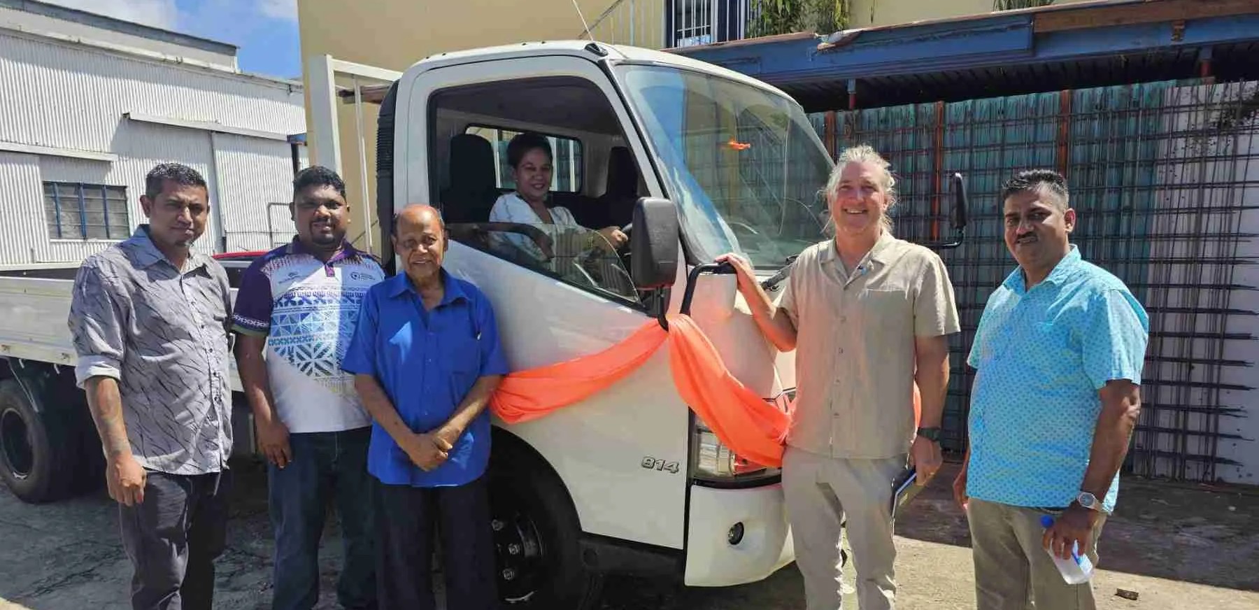 Group photo at Dispatch & Delivery truck handover, Fiji Dispatch & Delivery Fiji – Truck Handover